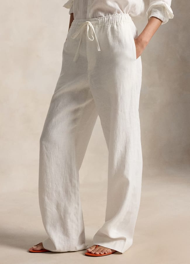 close up of model's legs wearing RL Linen Drawstring Trousers in white