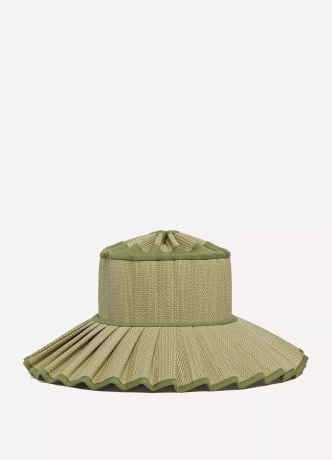 A wide-brimmed, olive-green hat with a pleated edge and textured fabric—perfect for deciding what to wear in Ibiza—displayed against a plain white background.