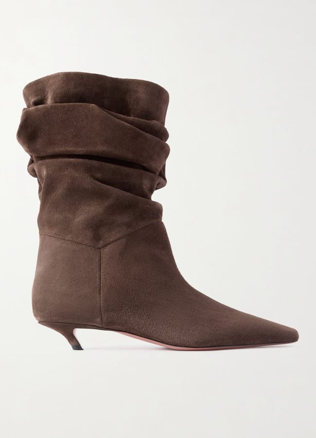 A brown suede slouchy mid-calf boot with a pointed toe and a low kitten heel, shown in profile on a white background—perfect for styling up your look during our Summer Sale.