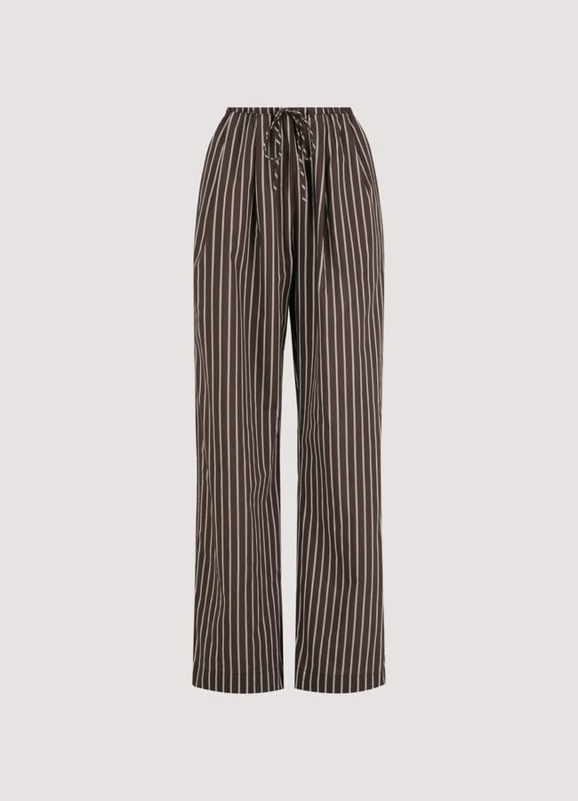 Brown and white vertically striped, wide-leg trousers with a drawstring waistband, perfect for breezy days—now featured in our Summer Sale, displayed against a plain white background.