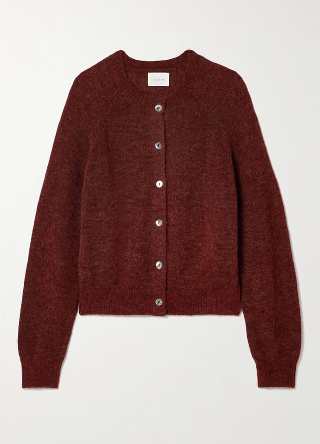 A long-sleeved, button-up cardigan in a deep burgundy colour, displayed flat on a white background—perfect for layering and now available as part of our Summer Sale.