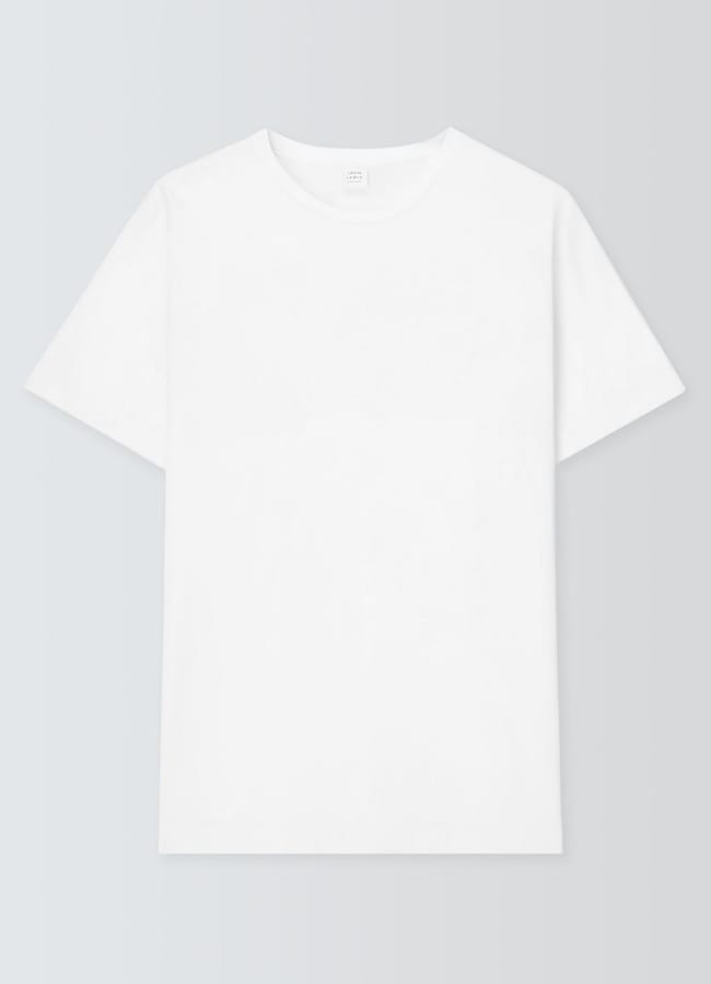 A plain white short-sleeve T-shirt, reminiscent of the effortless style often seen on Celebrity Couples On Holiday, is displayed on a light grey background.