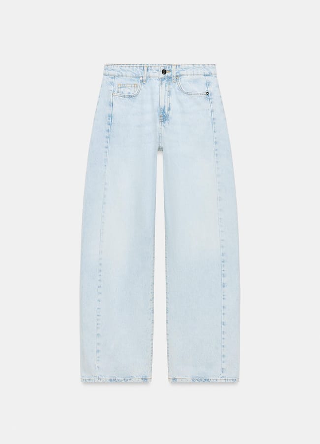 Light blue, high-waisted wide-leg jeans with a button and zip fastening, front and back pockets, and visible front seams—new in at Zara—displayed on a plain white background.