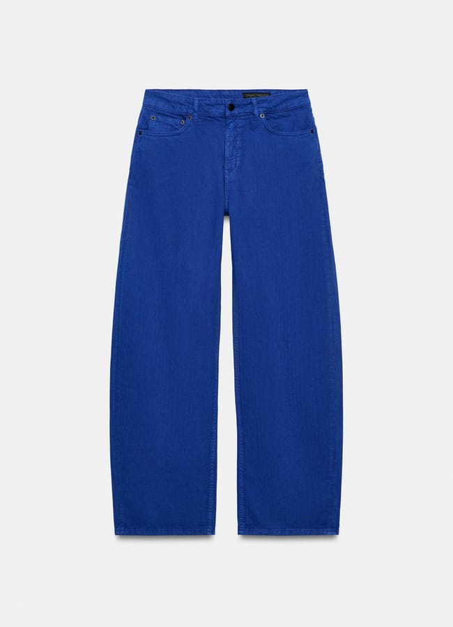 Bright blue wide-leg jeans with a high waist, five pockets, belt loops, and a button fly—new in at Zara—displayed against a plain white background.