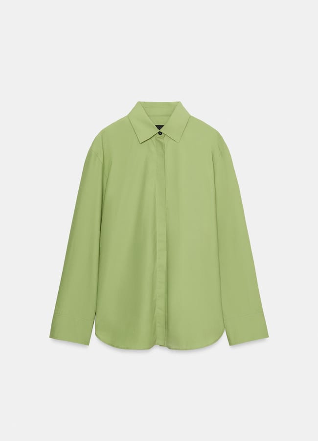 Light green, long-sleeve button-up shirt with a collar, displayed against a plain white background. New in at Zara, this shirt features a relaxed fit and clean, simple lines.