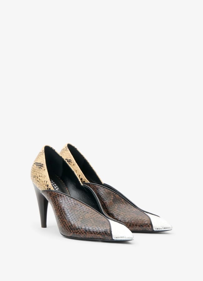 A pair of sexy heels featuring a striking snakeskin pattern, pointed silver metallic toes, and beige and brown colouring, displayed on a white background.