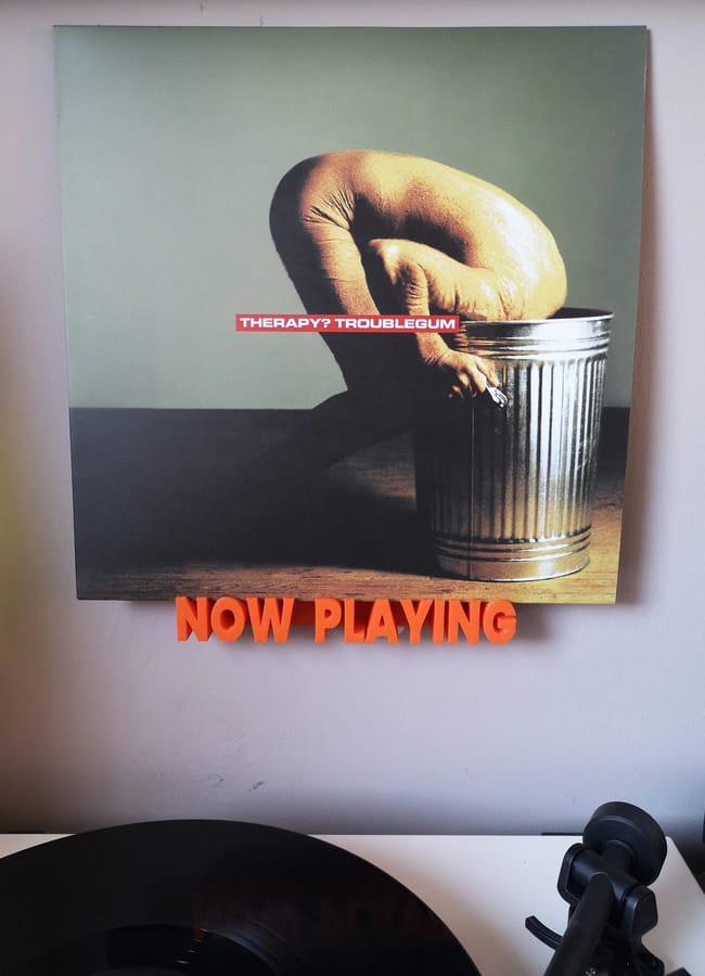 Therapy? Troublegum vinyl record displayed on a Now Playing wall mount, perfect for listening room interior ideas.