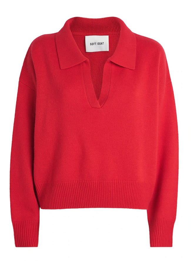 Bright red long-sleeved polo jumper with a split collar and ribbed hem.
