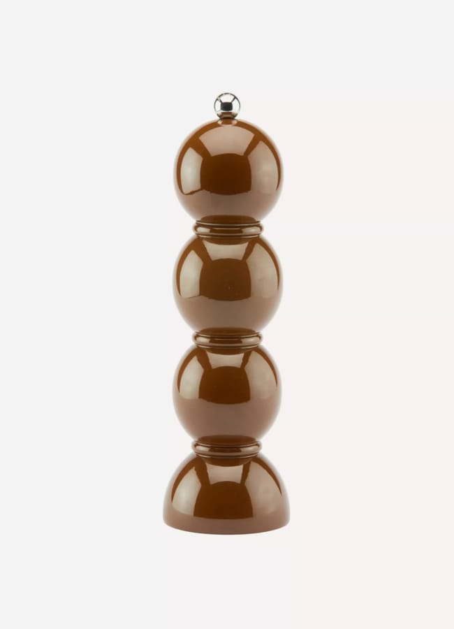 Brown pepper mill shaped like a vertical stack of spheres, perfect for autumn tablescape ideas.