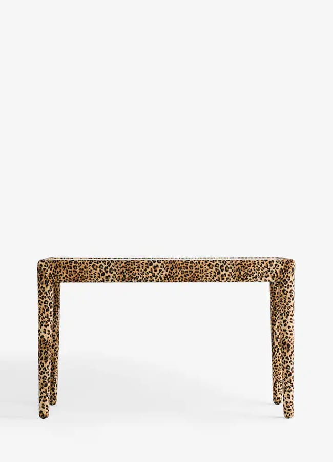 Console table with a Rockett St George leopard print pattern.