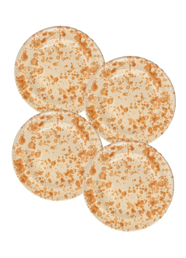Four round plates with a tan base and brown speckled pattern perfect for autumn tablescape ideas.