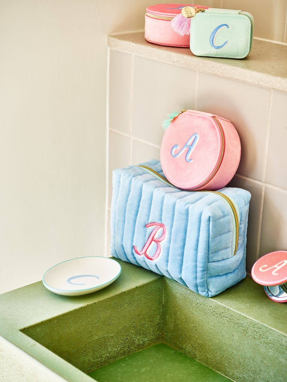 makeup bags on bathroom sink