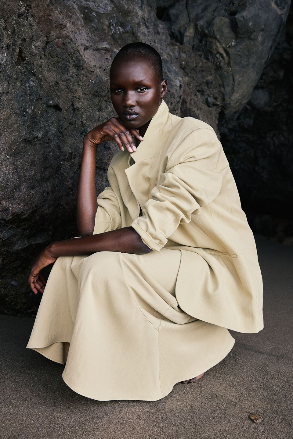 model in lemon suit jacket and skirt