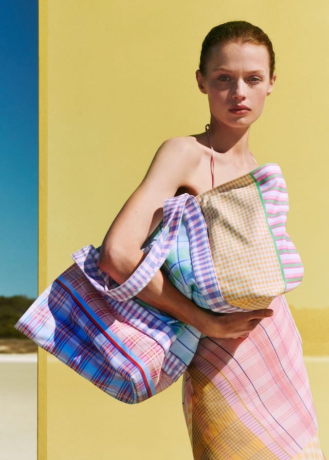 model wearing printed bag